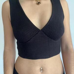 Black ribbed knit tank top with a V-neckline and stretchy